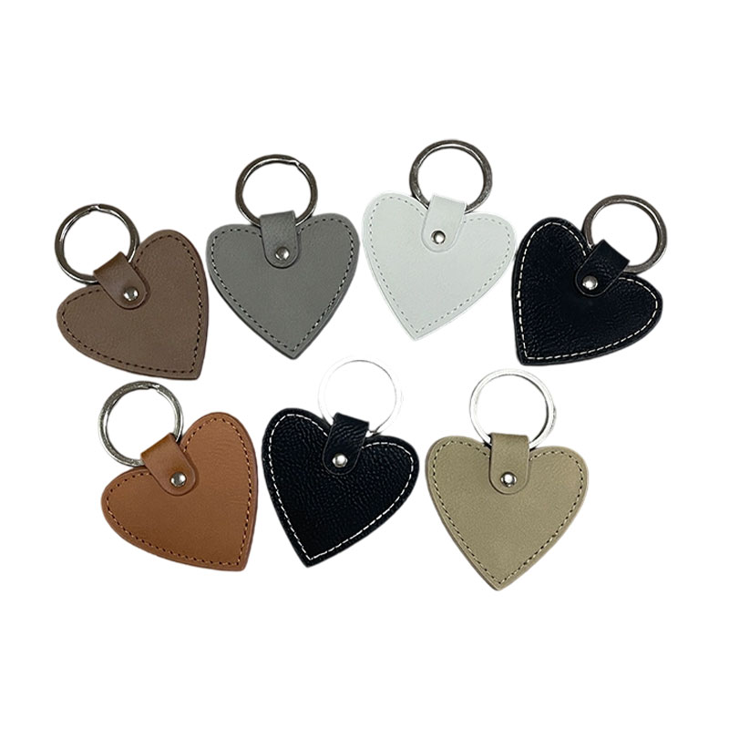 Portachiavi a forma di cuore in similpelle laserabile con bordo oliato